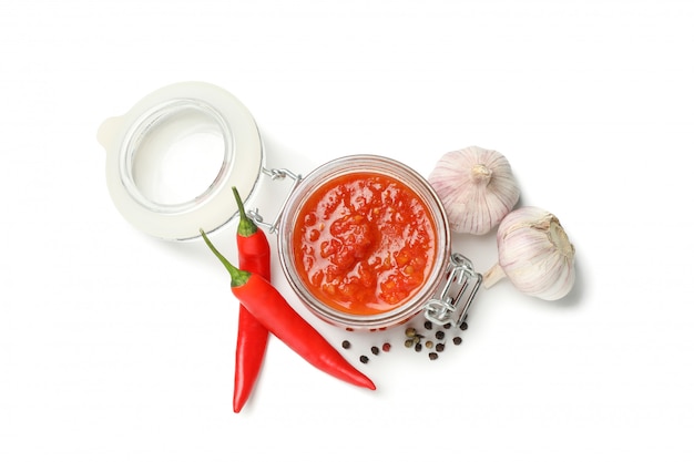 Download Premium Photo Tasty Chili Sauce In Glass Jar And Ingredients Isolated On White Background