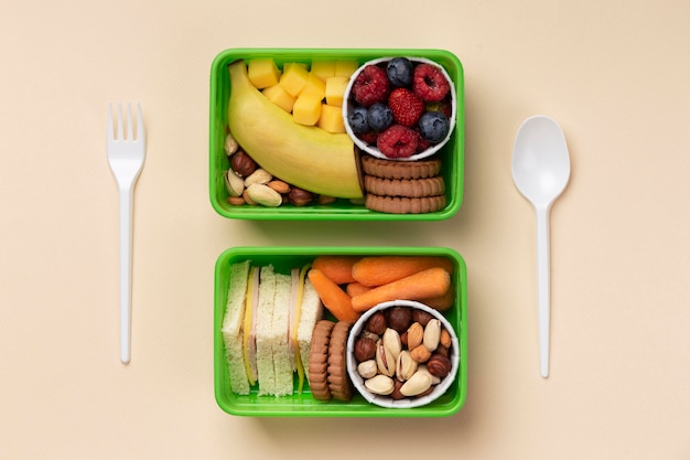 Free Photo | Tasty food lunch boxes arrangement flat lay