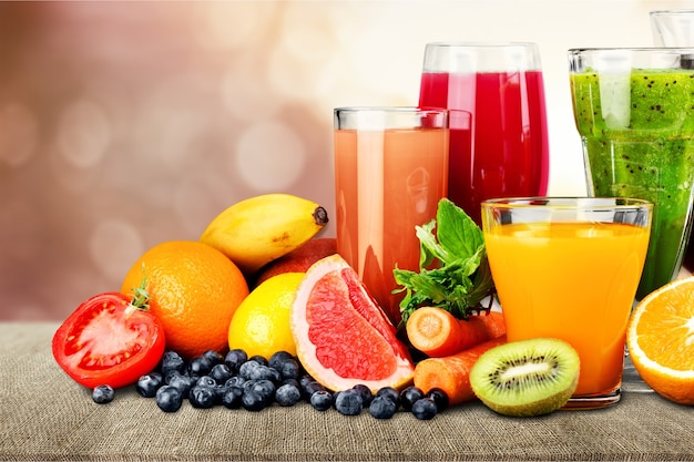 Premium Photo | Tasty fruits and juice with vitamins on