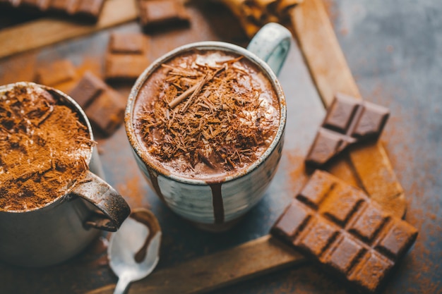 Premium Photo | Tasty hot chocolate drink in mugs