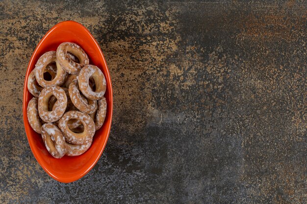 Free Photo Tasty Salted Crackers In Orange Bowl