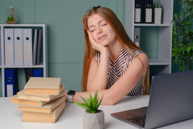 Premium Photo | The teacher checks the students homework and is very ...