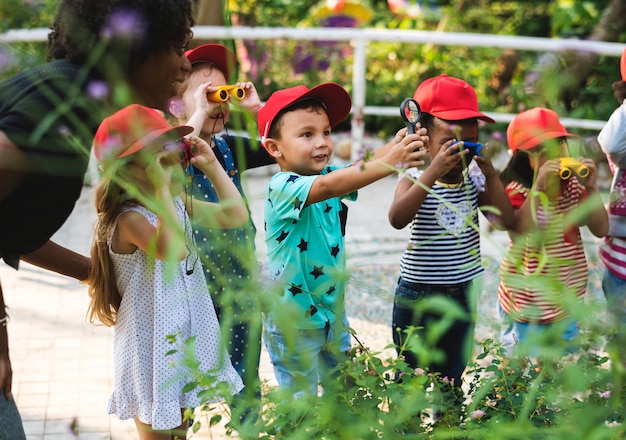 Premium Photo | Teacher and kids school learning ecology gardening