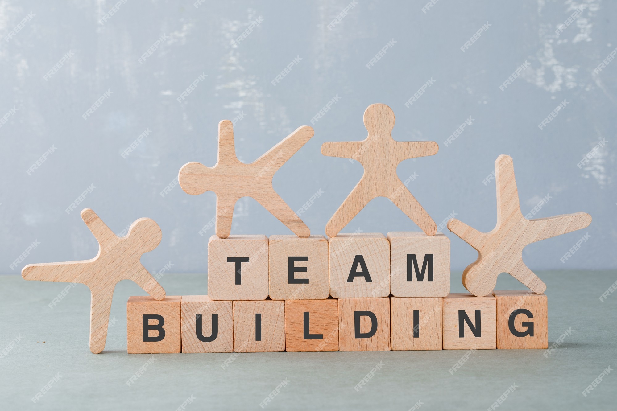 Free Photo | Team building concept with wooden blocks, wooden human ...