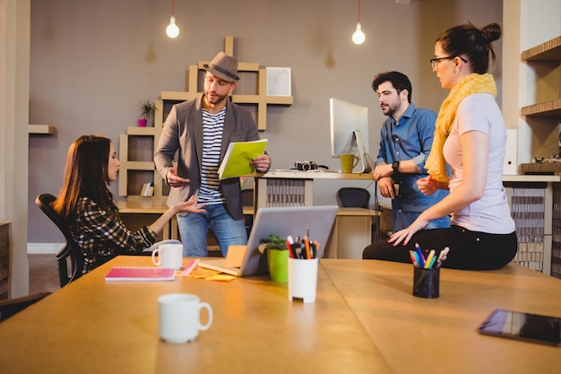 Premium Photo | Team of graphic designers having a meeting