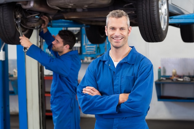 Premium Photo | Team of mechanics working together