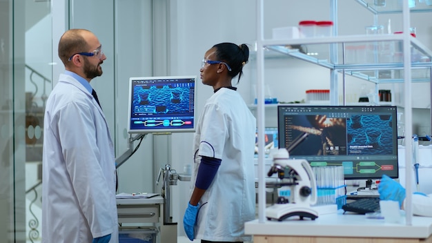 Premium Photo Team Of Multiethnic Scientists Working In Laboratory Analysing Test Trial 