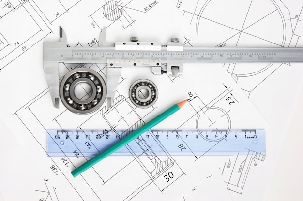 Premium Photo | Technical drawing and caliper with bearing