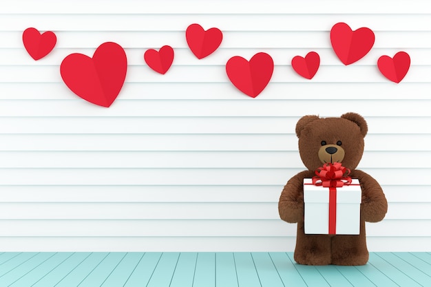 teddy bear holding gift box