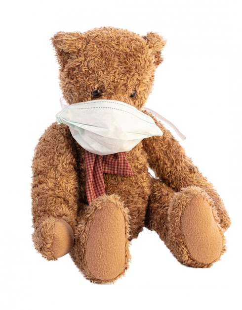 Premium Photo | Teddy bear with a protective mask