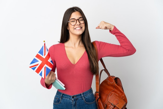 Premium Photo | Teenager brazilian girl holding an united kingdom flag ...