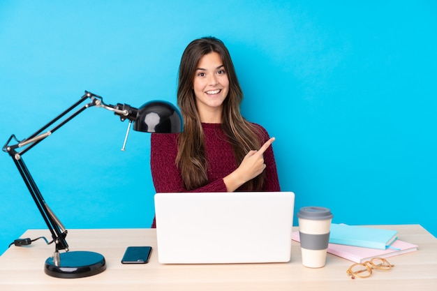 Teenager Girl In A Table With Her Pc Premium Photo