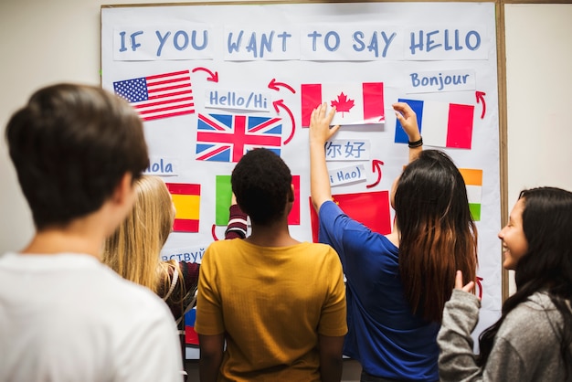 Teenager people at the national flags board Premium Photo