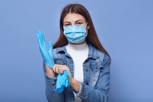 Teenager Woman With Surgical Mask And Gloves F