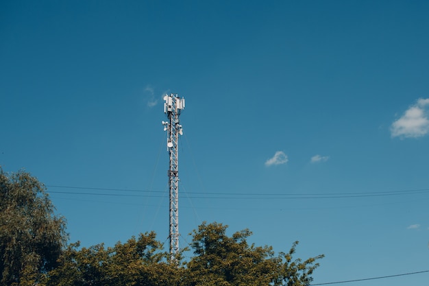 Mobile Phone Antenna Base Station Communication Tower in City Stock Photo -  Alamy