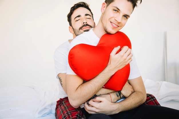 Free Photo Tender Gay Couple Embracing On Bed