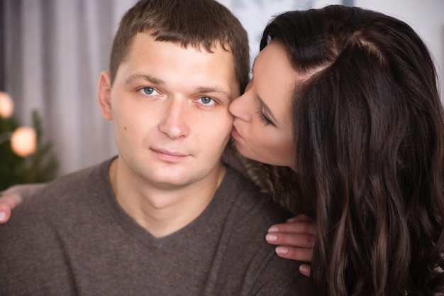 Premium Photo Tender Wife Kissing Husband