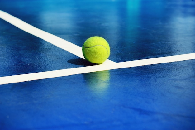 Premium Photo Tennis Ball Put On Court Background