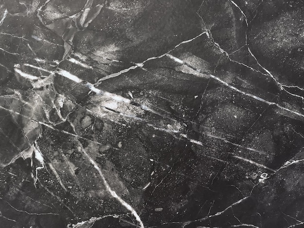  Texture of black marble with white lines, macro background