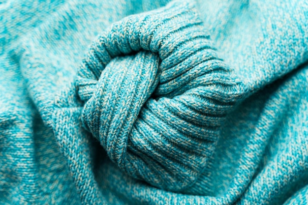 Premium Photo | The texture of a blue turquoise knitted fabric. crumpled  sweater background