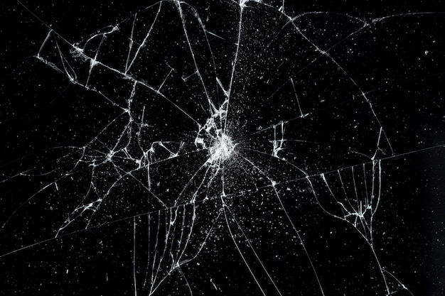 割れたガラスのテクスチャ 衝撃からひびの入った画面のスマートフォンの要約 プレミアム写真