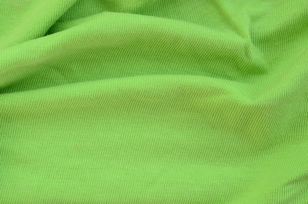 Premium Photo | The texture of the fabric is bright green. material for ...