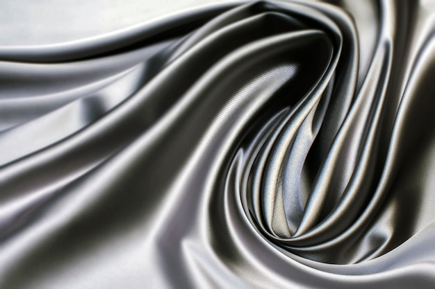 テクスチャ 服を縫うための灰色の合成生地 プレミアム写真