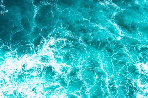 Premium Photo | Texture light blue surface of raging sea water with ...