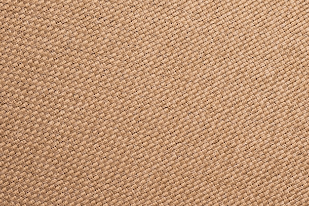 黄麻布 茶色の織物の背景のテクスチャ 荒布の表面 袋に入れた素材 袋に入れたテキスタイルの壁紙のクローズアップ プレミアム写真