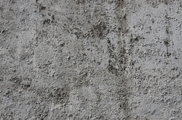 Premium Photo | Texture of the old embossed concrete wall in gray color.