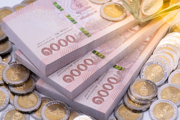 Premium Photo Thai Baht Banknotes And Coins premium-photo-thai-baht-banknotes-and-coins