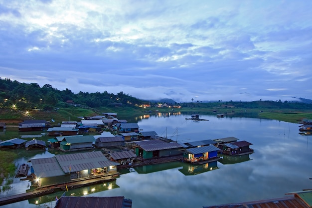 Premium Photo | Thai mon floating village on the river in sangkraburi ...