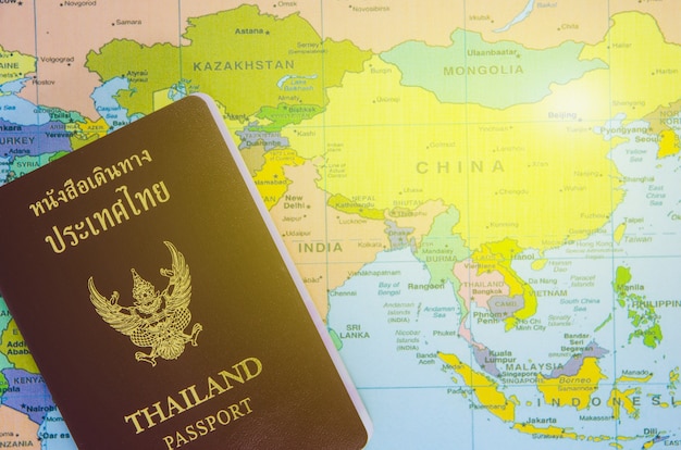 Premium Photo Thai Passport Lay On Asia Map   Thai Passport Lay Asia Map 45463 454 