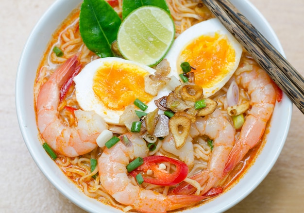 Premium Photo | Thai style noodle, tom yum kung