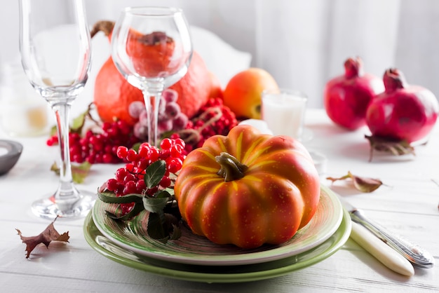 Premium Photo | Thanksgiving autumn place setting with cutlery and ...