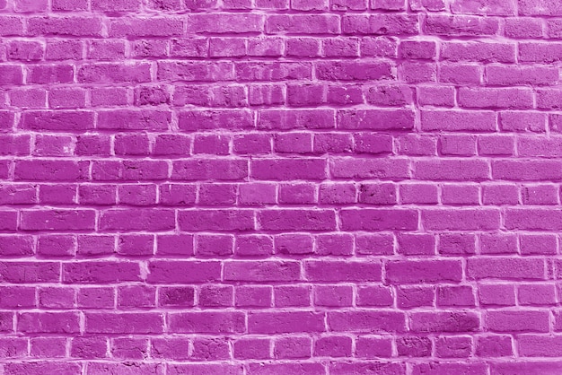 古いピンクのレンガの壁の壁紙の背景 プレミアム写真