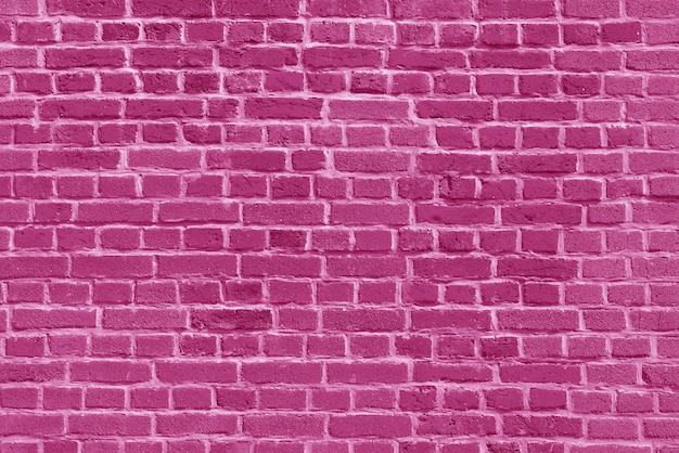古いピンクのレンガの壁の壁紙の背景 プレミアム写真