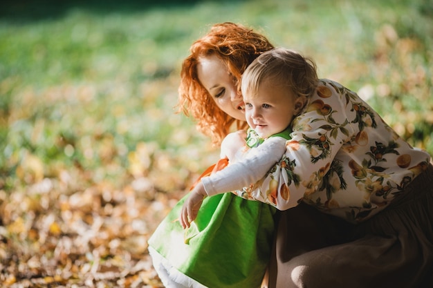 The mother embracing her daughter Free Photo The mother embracing her daughter Free Photo