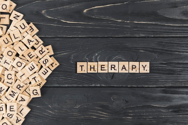 Free Photo | Therapy word on wooden background