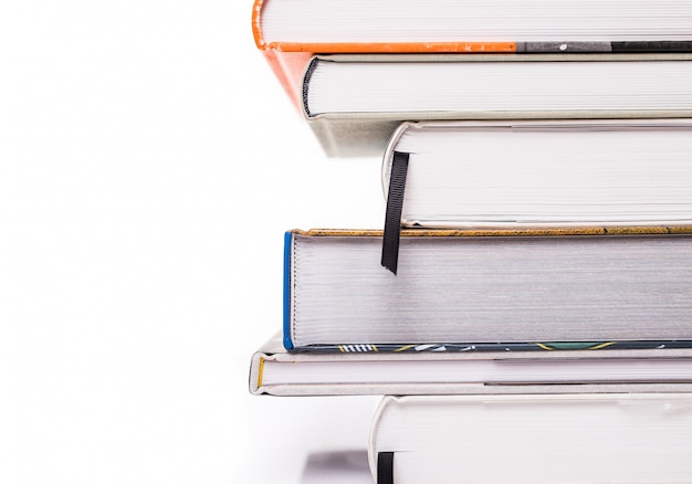 Thick books isolated on a white surface Free Photo