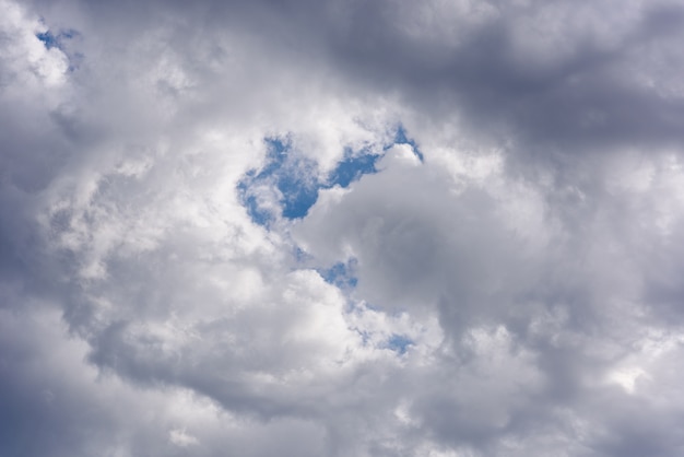 Premium Photo | Thick grey clouds accross dark sky.