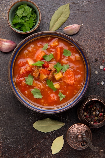 Premium Photo | Thick tomato soup with meat, cereals and vegetables