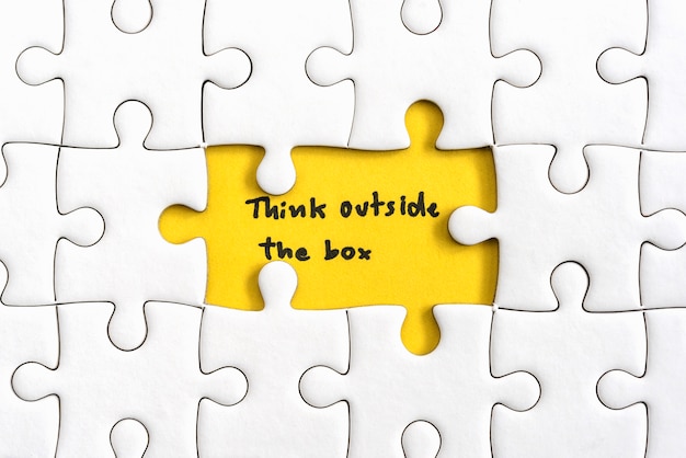 Think outside the box quotes business concept Free Photo