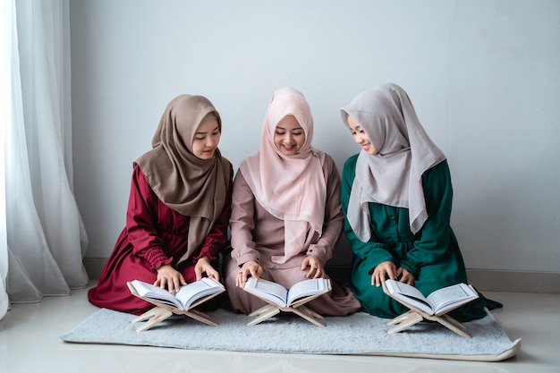 Download Free Three Asian Muslim Woman Read And Learn The Holy Book Of The Al Use our free logo maker to create a logo and build your brand. Put your logo on business cards, promotional products, or your website for brand visibility.