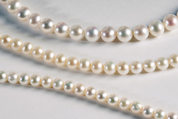 Premium Photo | Three different strands of cultured pearls