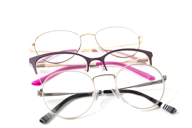Premium Photo | Three pairs of fashionable eyeglass frames