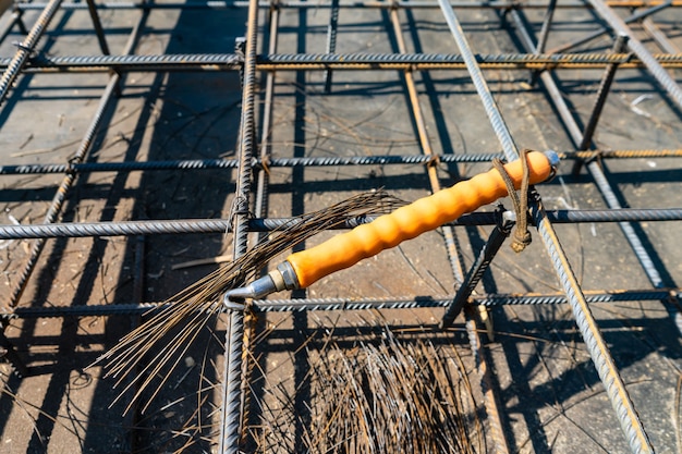 Premium Photo | Tie rebar beam cage on construction site. steel ...