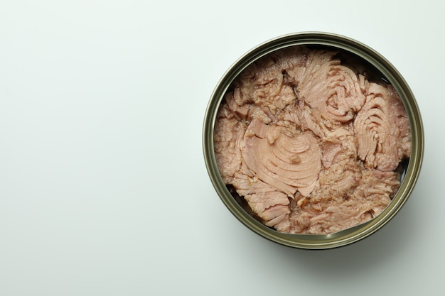 Premium Photo | Tin with canned tuna on white background