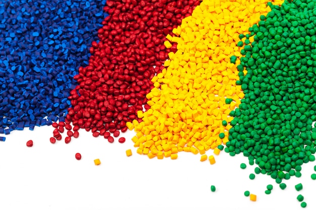 Tinted plastic granulate for injection moulding process Premium Photo