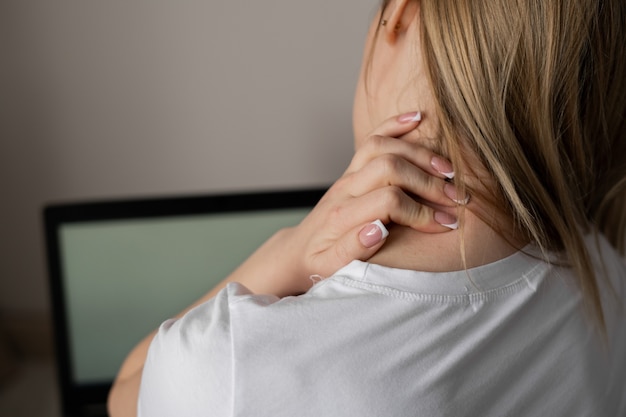 Premium Photo | Tired woman feeling neck pain, massaging tense muscles ...